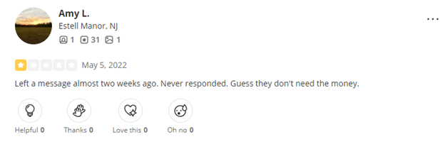 Screenshot of a customer review expressing dissatisfaction with a company's lack of response to a message left two weeks prior.